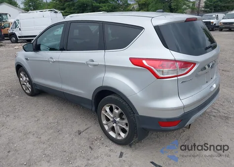 2013 Ford Escape Sel z USA, uszkodzony, nr VIN 1FMCU9H99DUB67900